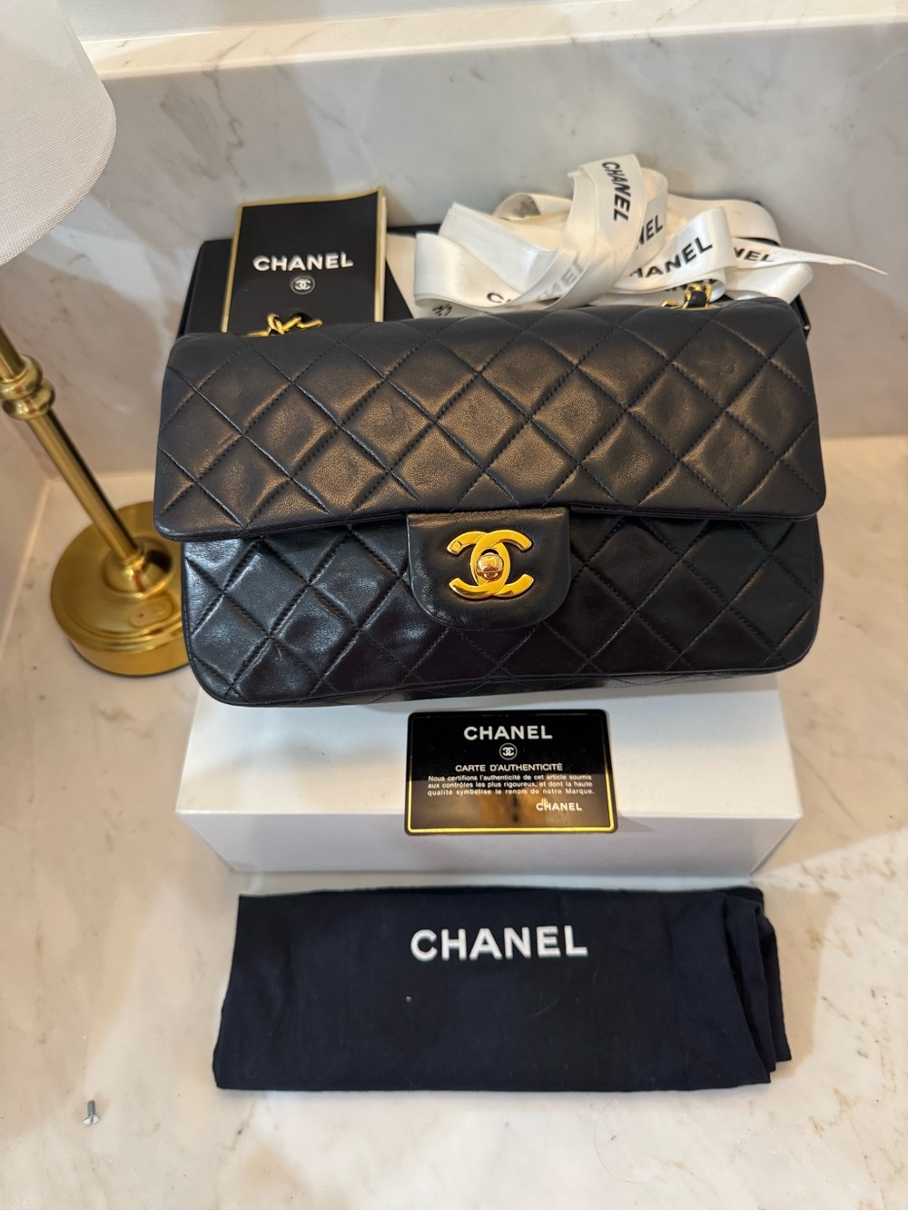 CHANEL Black Quilted Leather Shoulder Bag with Gold CC Lock